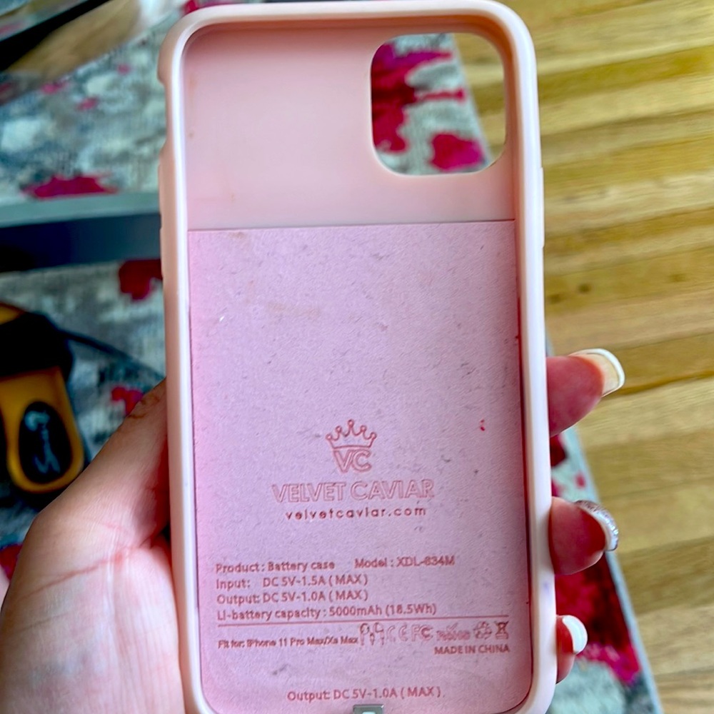 Slightly used but in excellent working condition. Self charging case.iPhone 11pm